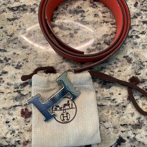 Hermès  Buckle and reversible red/orange belt